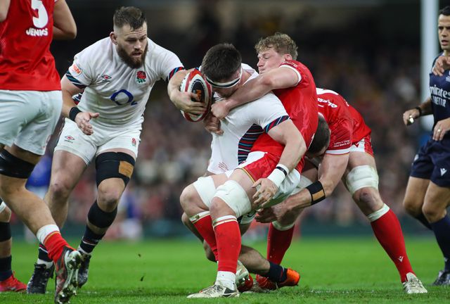 Tom Curry of England is tackled by Jac Morgan of Wales during the 2025 Guinness 6 Nations match Wales vs England at Principality Stadium, Cardiff, United Kingdom, 15th March 2025

(Photo by Andrew Lewis/News Images)