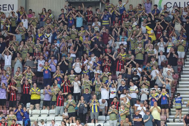 Warrington fans celebrate the try of Ewan Irwin of Warrington Wolves during the Betfred Super League round 18 match Wigan Warriors vs Warrington Wolves at The Brick Community Stadium, Wigan, United Kingdom on 10 July 2026

(Photo by Mark Cosgrove/News Images)