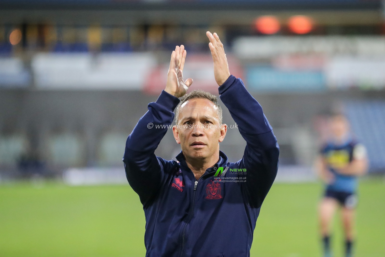 21st June 2019 , John Smiths Stadium, Huddersfield, England; Betfred Super League, Round 19, Huddersfield Giants vs Wigan Warriors ; Adrian Lam head coach of Wigan Warriors applauds the Wigan fans as they win Huddersfield


Credit Mark Cosgrove/News Images
