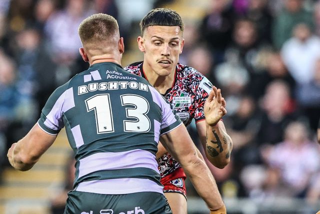 Owen Trout of Leigh Leopards is tackled by Harry Rushton of Huddersfield Giants during the Betfred Super League round 9 match Leigh Leopards vs Huddersfield Giants at Leigh Sports Village, Leigh, United Kingdom on 23 April 2026

(Photo by Alfie Cosgrove/News Images)