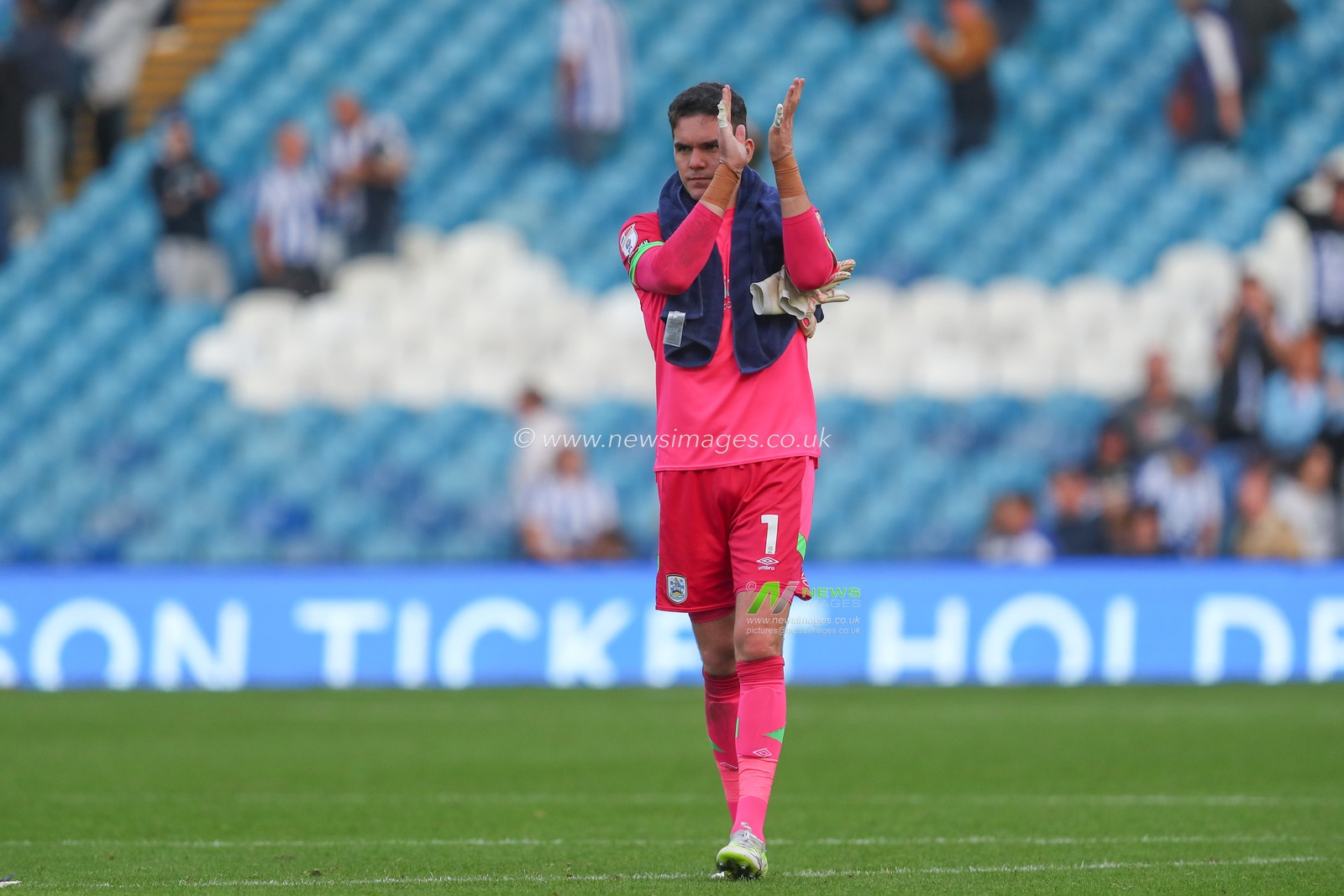 Lee Nicholls #1 of Huddersfield Town applauds the travelling fans after the Sky Bet Championship match Sheffield Wednesday vs Huddersfield Town at Hillsborough, Sheffield, United Kingdom, 7th October 2023

(Photo by Gareth Evans/News Images)