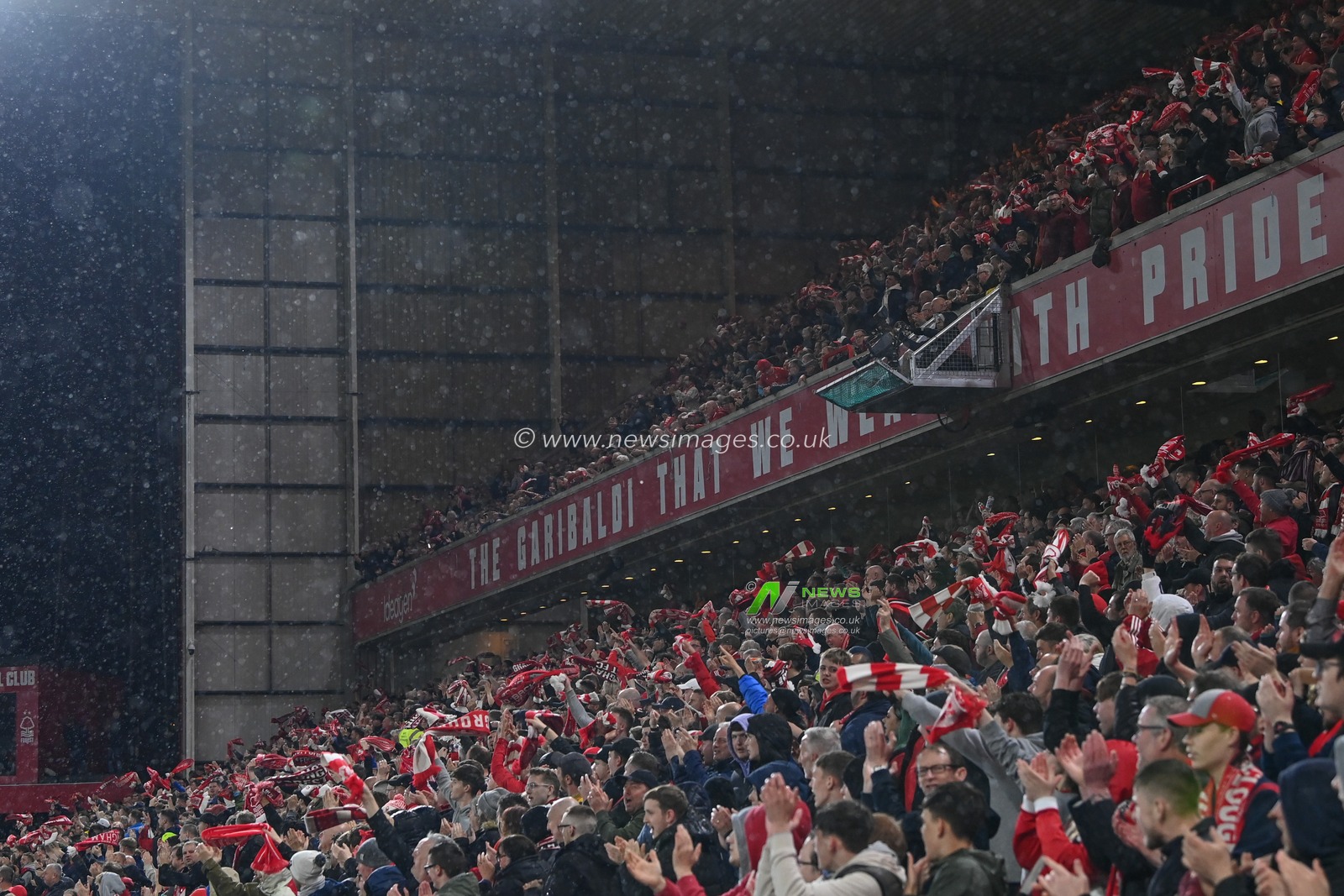 Nottingham Forest fans wave scarves in the air to celebrate the goal to make it 4-2 during the Premier League match Nottingham Forest vs Southampton at City Ground, Nottingham, United Kingdom, 8th May 2023

(Photo by Craig Thomas/News Images)