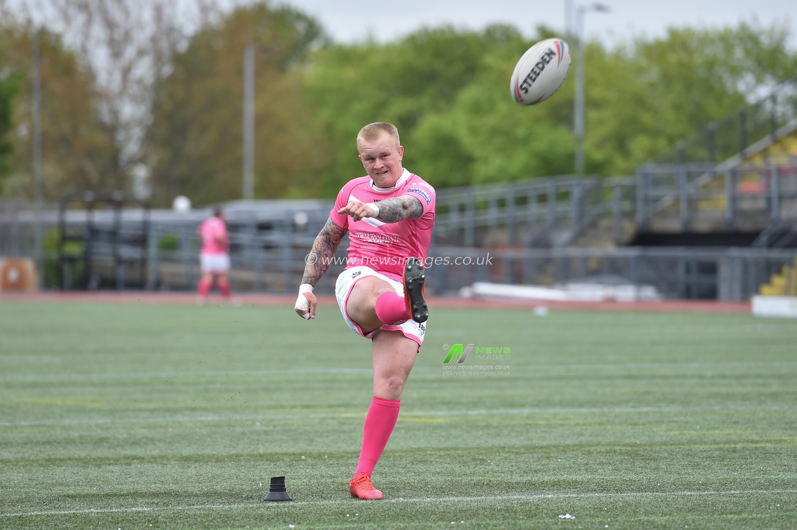 Brad Billsborough of North Wales Crusaders kicks the penalty from the try
