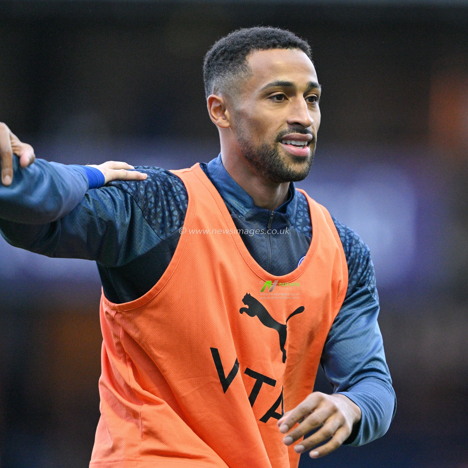 Ibou Touray 3# of Stockport County Football Club warms up ahead of the match, during the Sky Bet League 2 match Stockport County vs Colchester United at Edgeley Park Stadium, Stockport, United Kingdom, 18th November 2023

(Photo by Cody Froggatt/News Images)