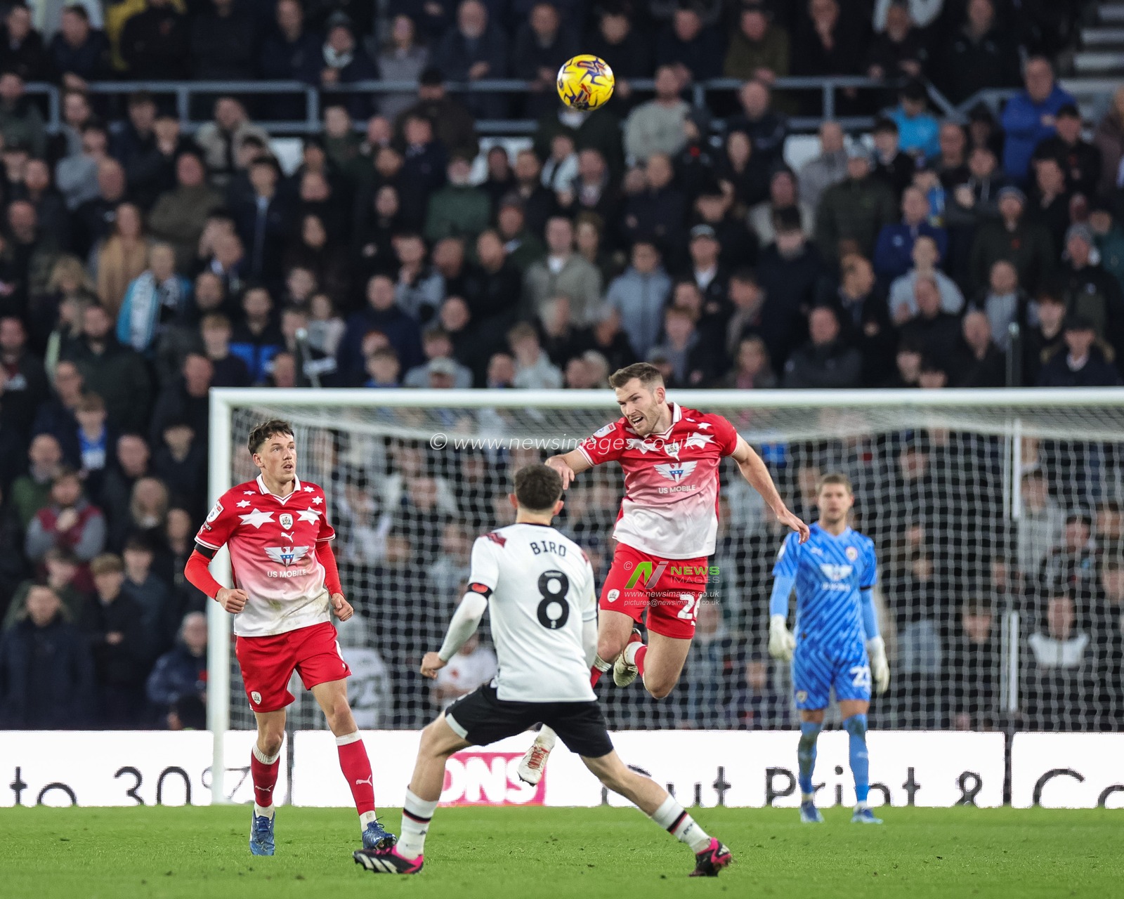 Jamie McCart #26 of Barnsley jumps up to win the high ball during the Sky Bet League 1 match Derby County vs Barnsley at Pride Park Stadium, Derby, United Kingdom, 11th November 2023

(Photo by Mark Cosgrove/News Images)