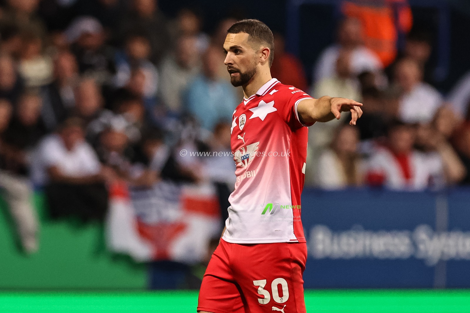 Adam Phillips of Barnsley gives his team instructions during the Sky Bet League 1 Play-offs Semi-final second leg match Bolton Wanderers vs Barnsley at Toughsheet Community Stadium, Bolton, United Kingdom, 7th May 2024

(Photo by Mark Cosgrove/News Images)