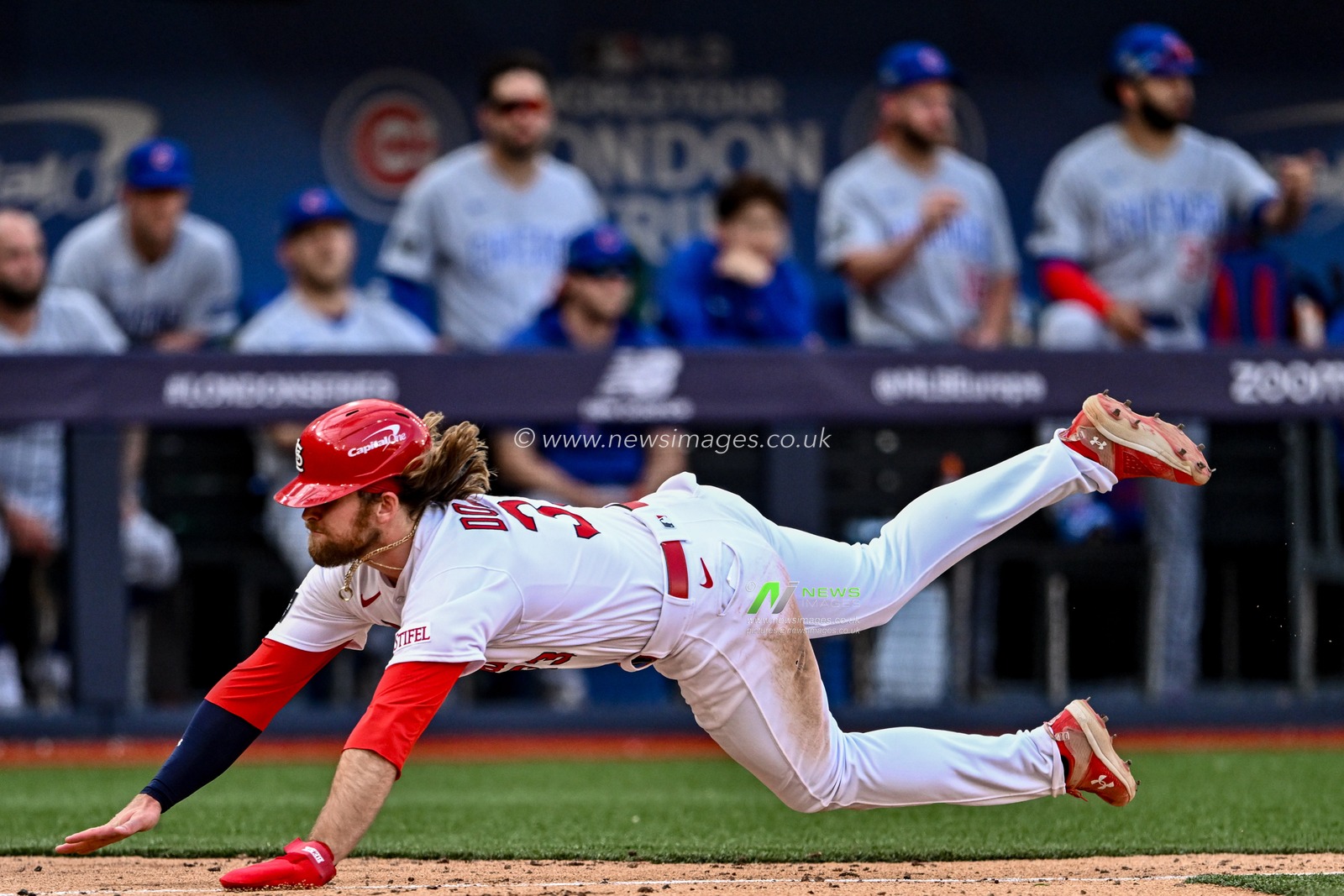 Brendan Donovan #33 of the St. Louis Cardinals dives onto home plate during the 2023 MLB London Series match St. Louis Cardinals vs Chicago Cubs at London Stadium, London, United Kingdom, 25th June 2023

(Photo by Craig Thomas/News Images)