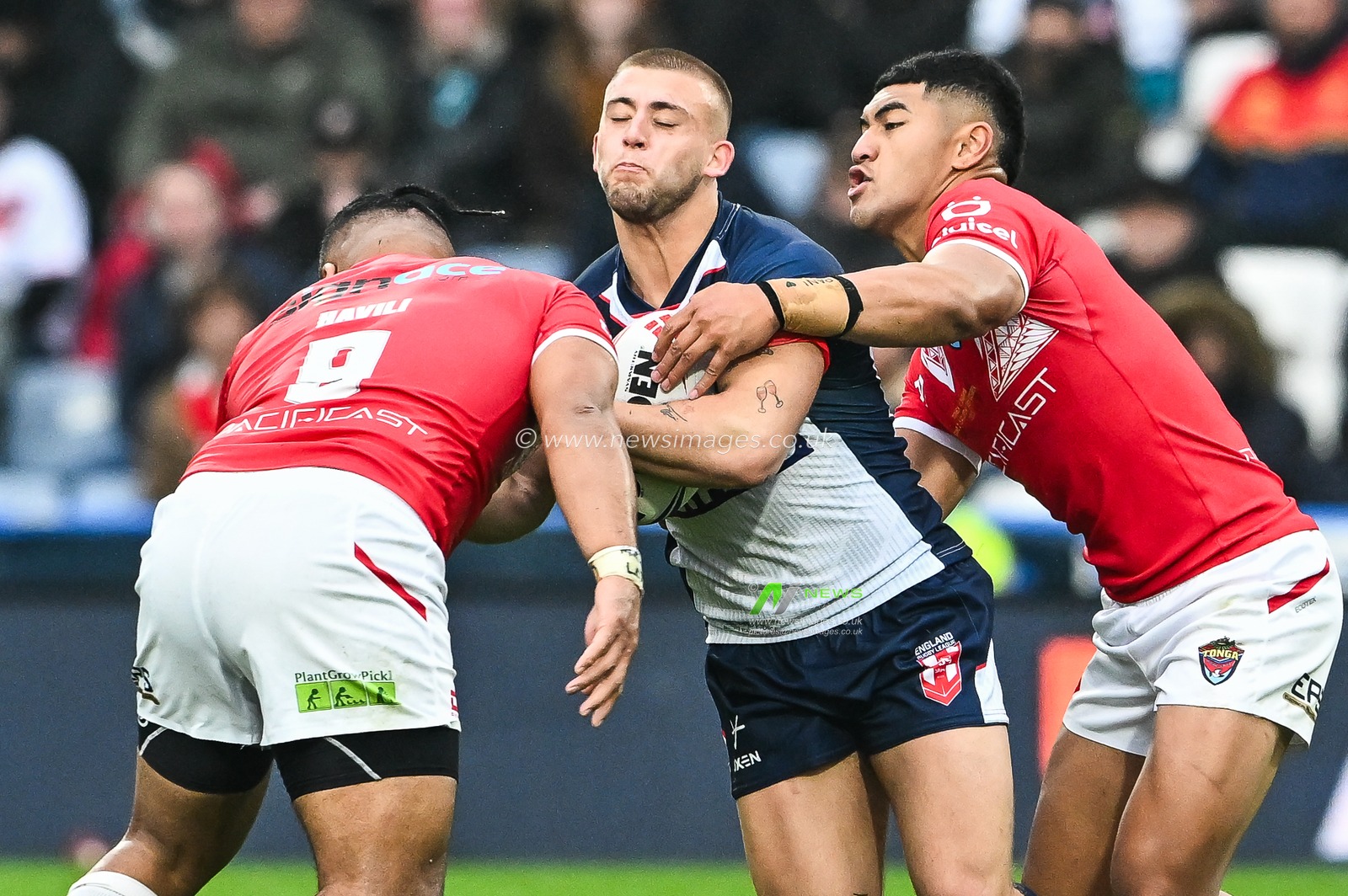Mikey Lewis of England is tackled by Siliva Havili of Tonga during the Rugby League International match England vs Tonga at John Smith's Stadium, Huddersfield, United Kingdom, 28th October 2023

(Photo by Craig Thomas/News Images)