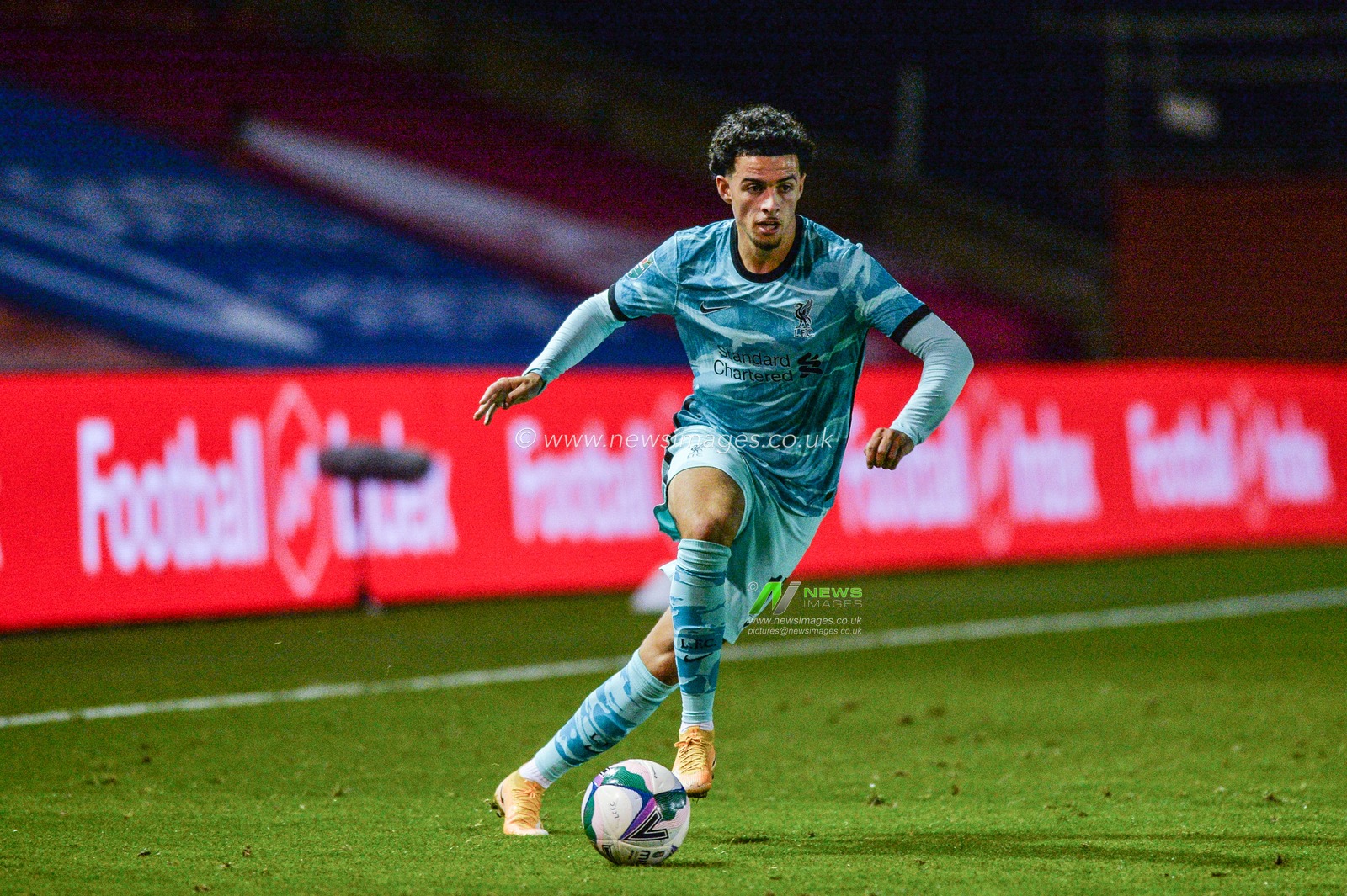 Curtis Jones (17) of Liverpool in action.