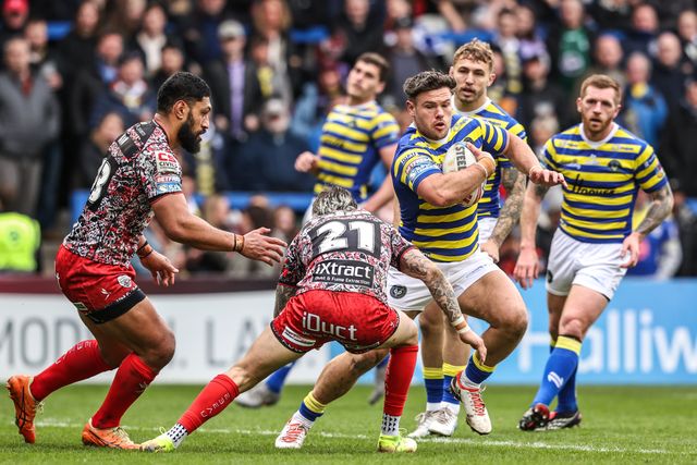 Joe Philbin of Warrington Wolves is tackled by Gareth O'Brien of Leigh Leopards during the Betfred Super League round 7 match Warrington Wolves vs Leigh Leopards at The Halliwell Jones Stadium, Warrington, United Kingdom on 04 April 2026

(Photo by Alfie Cosgrove/News Images)