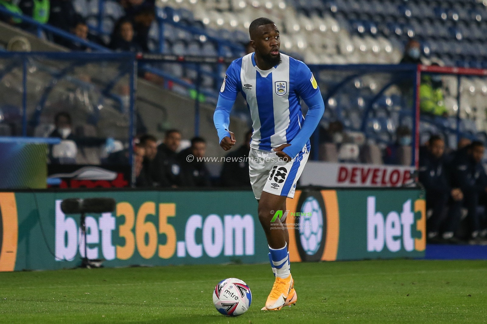 Isaac Mbenza (18) of Huddersfield Town with the ball