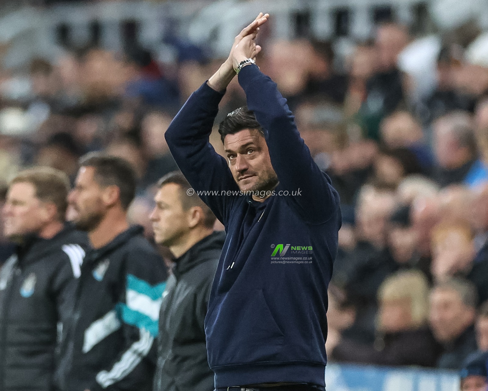 Johnnie Jackson manager of AFC Wimbledon applauds the travelling fans as they chant his name during the Carabao Cup 3rd Round Newcastle United vs AFC Wimbledon at St. James's Park, Newcastle, United Kingdom, 1st October 2024

(Photo by Mark Cosgrove/News Images)