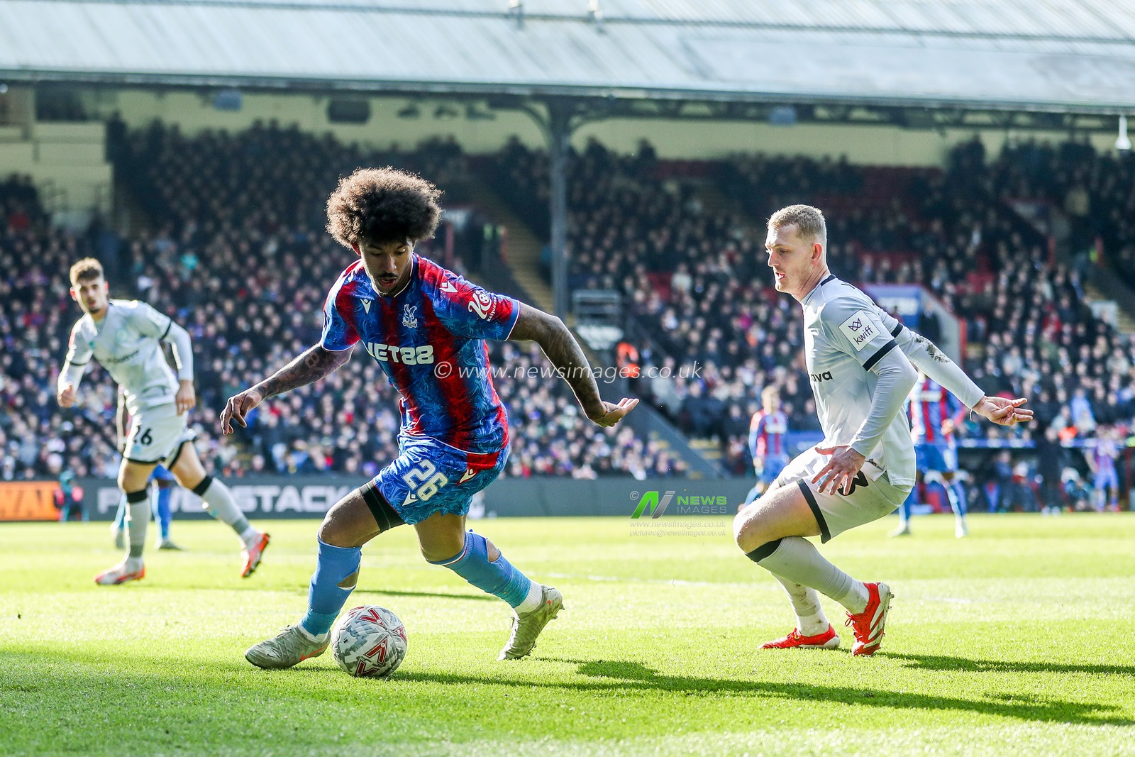 Chris Richards of Crystal Palace is put under pressure by George Saville of Millwall during the Emirates FA Cup 5th Round match Crystal Palace vs Millwall at Selhurst Park, London, United Kingdom, 1st March 2025

(Photo by Izzy Poles/News Images)