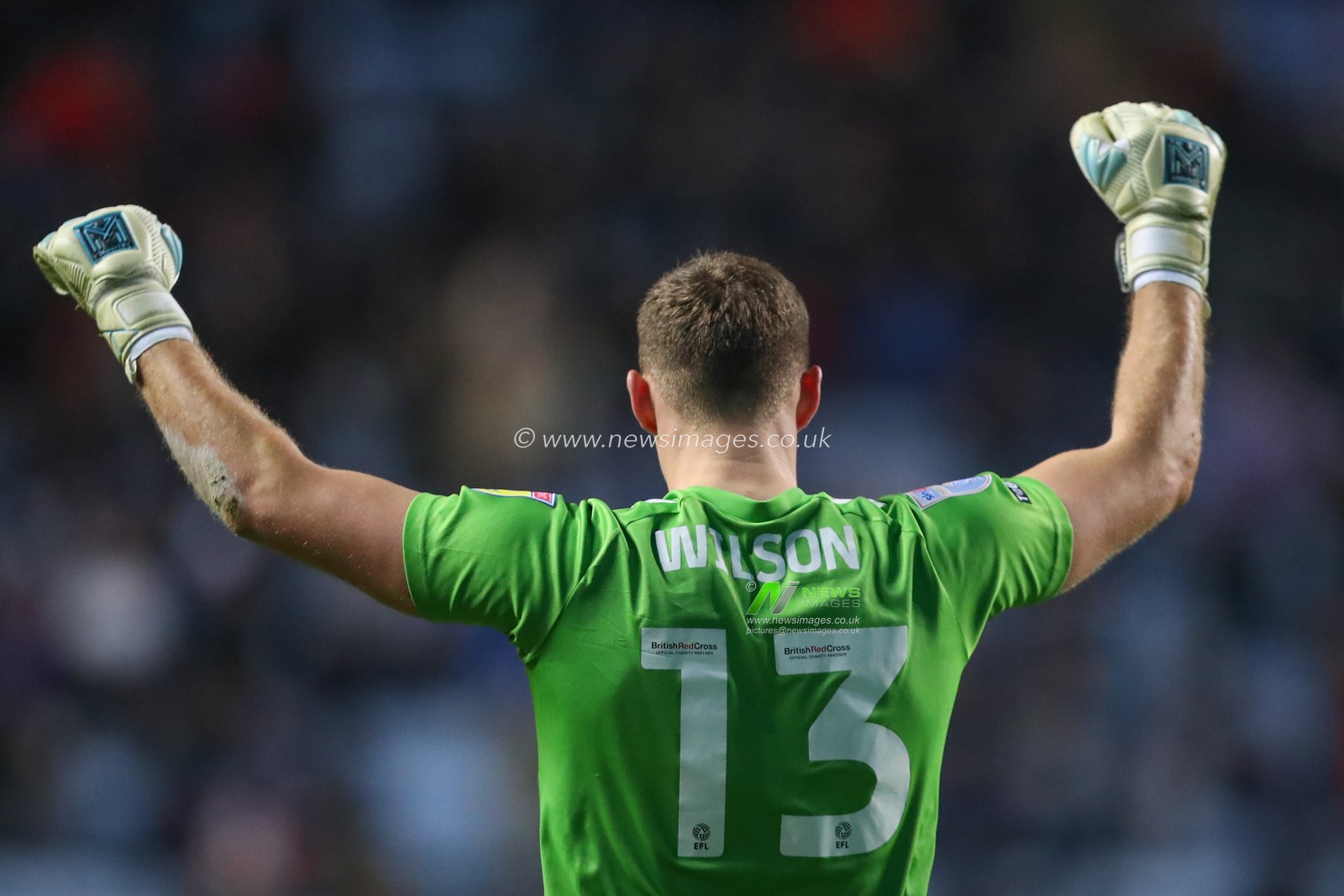 Ben Wilson #13 of Coventry City celebrates his teams win after the Sky Bet Championship match Coventry City vs West Bromwich Albion at Coventry Building Society Arena, Coventry, United Kingdom, 21st December 2022

(Photo by Gareth Evans/News Images)