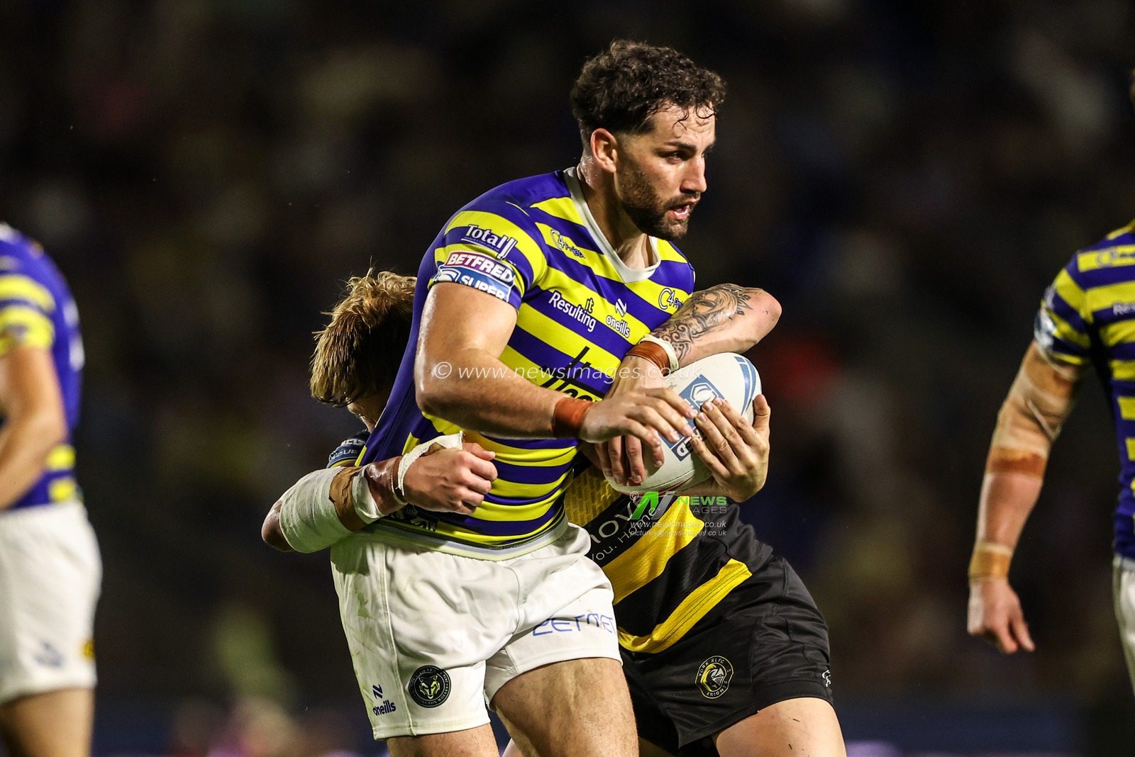 Toby King of Warrington Wolves is tackled by Jack Martin of York Knights during the Betfred Super League round 23 match Warrington Wolves vs York Knights at The Halliwell Jones Stadium, Warrington, United Kingdom on 13 August 2026

(Photo by Alfie Cosgrove/News Images)