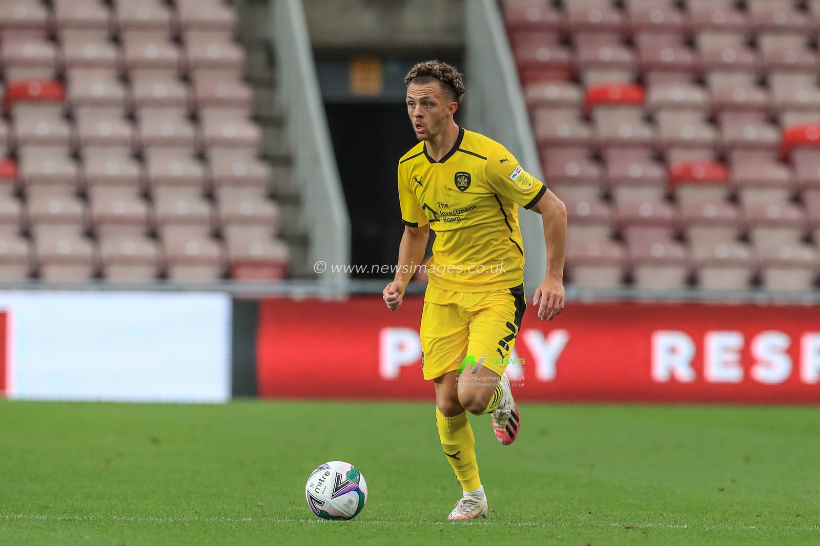 Jordan Williams (2) of Barnsley breaks with the ball