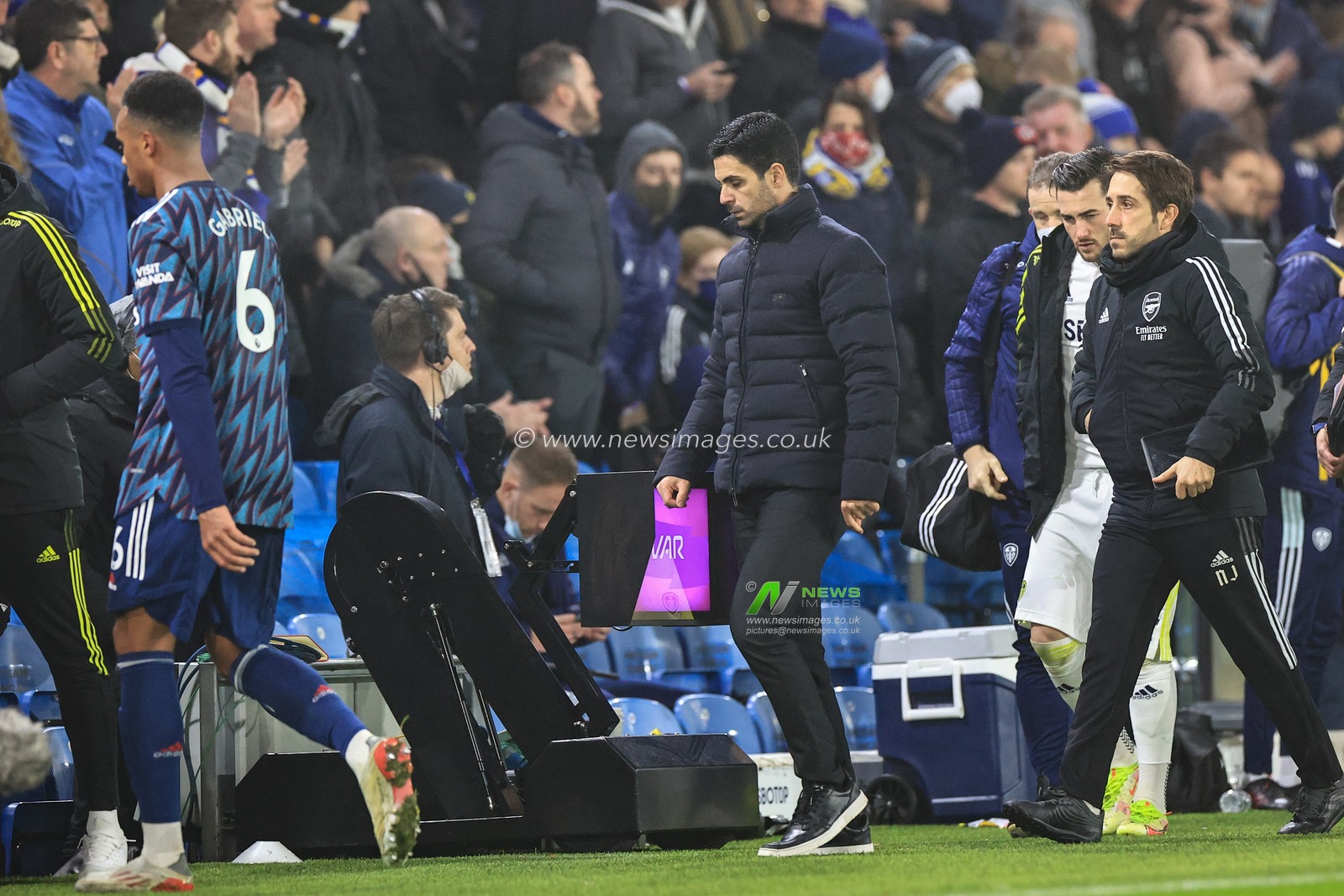 Mikel Arteta manager of Arsenal heads back to the changing rooms at half time three goals up