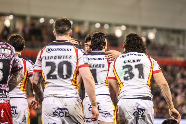 Charlie Staines of Catalans Dragons celebrates his try during the Betfred Super League match Leigh Leopards vs Catalans Dragons at Leigh Sports Village, Leigh, United Kingdom on 06 March 2026

(Photo by Alfie Cosgrove/News Images)