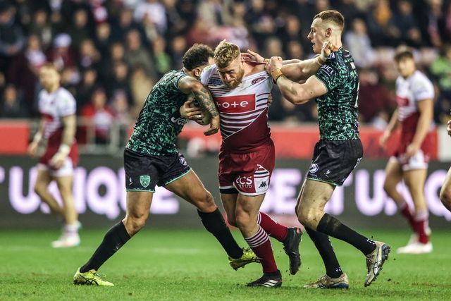 Luke Thompson of Wigan Warriors is tackled by Frankie Halton of Leigh Leopards during the Betfred Super League match Wigan Warriors vs Leigh Leopards at The Brick Community Stadium, Wigan, United Kingdom on 26 February 2026

(Photo by Alfie Cosgrove/News Images)