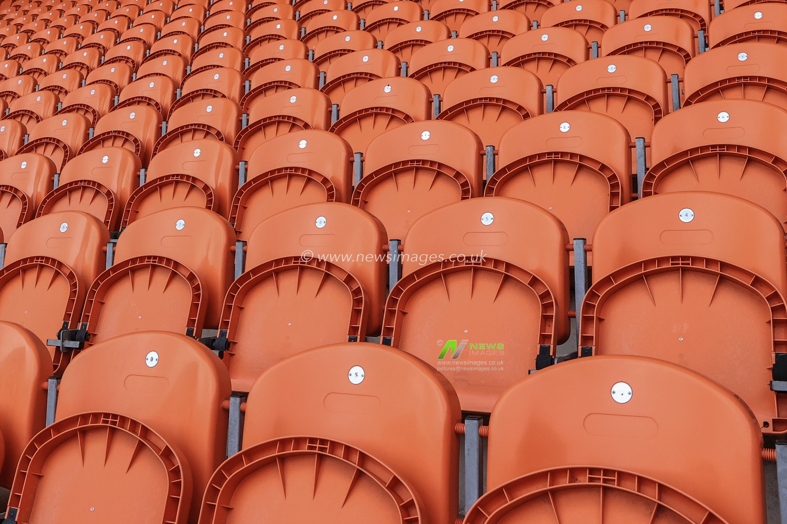The tangerine seats of Bloomfield Road