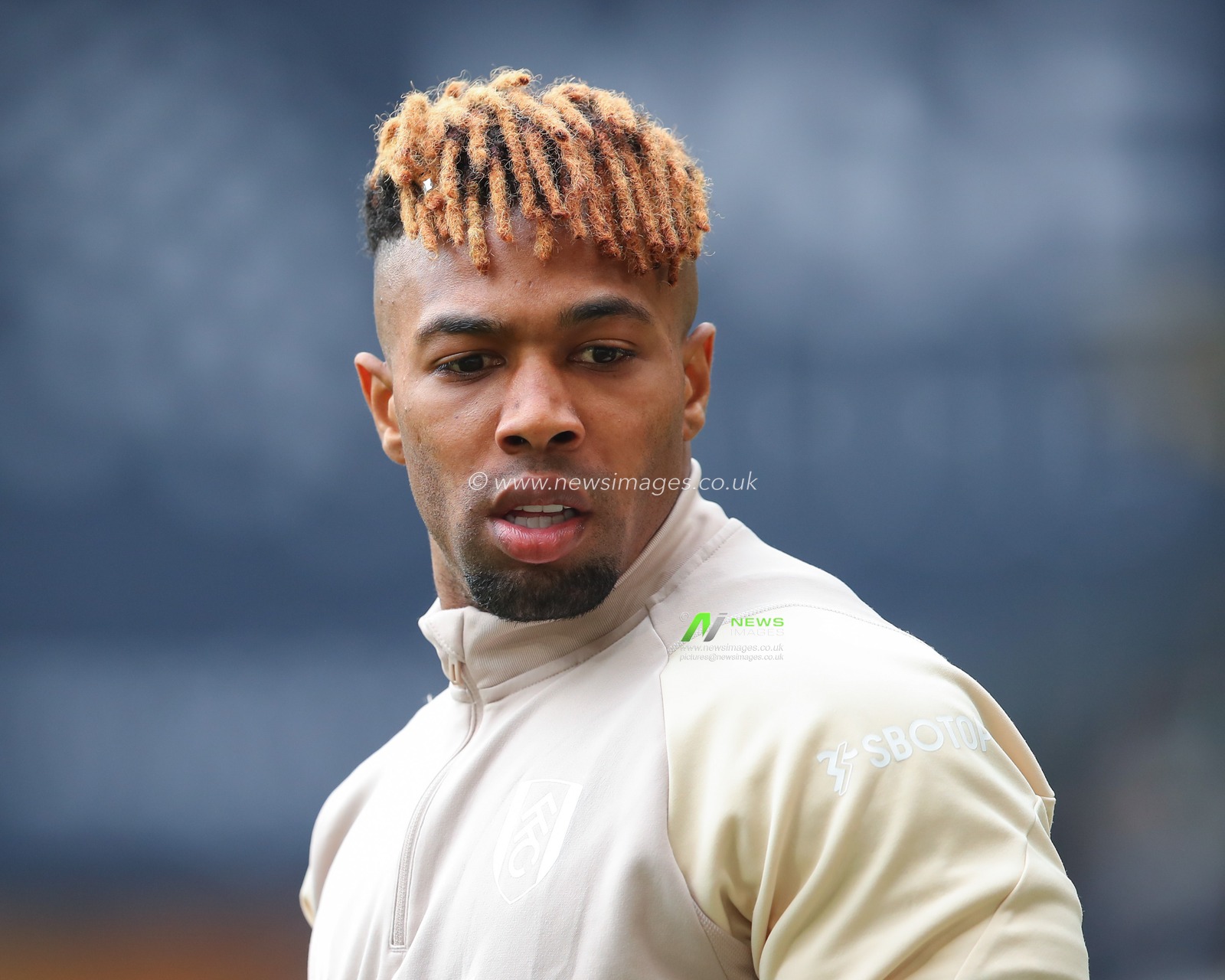 Adama TraorÃ© of Fulham warms up ahead of the match, during the Premier League match Wolverhampton Wanderers vs Fulham at Molineux, Wolverhampton, United Kingdom, 9th March 2024

(Photo by Gareth Evans/News Images)