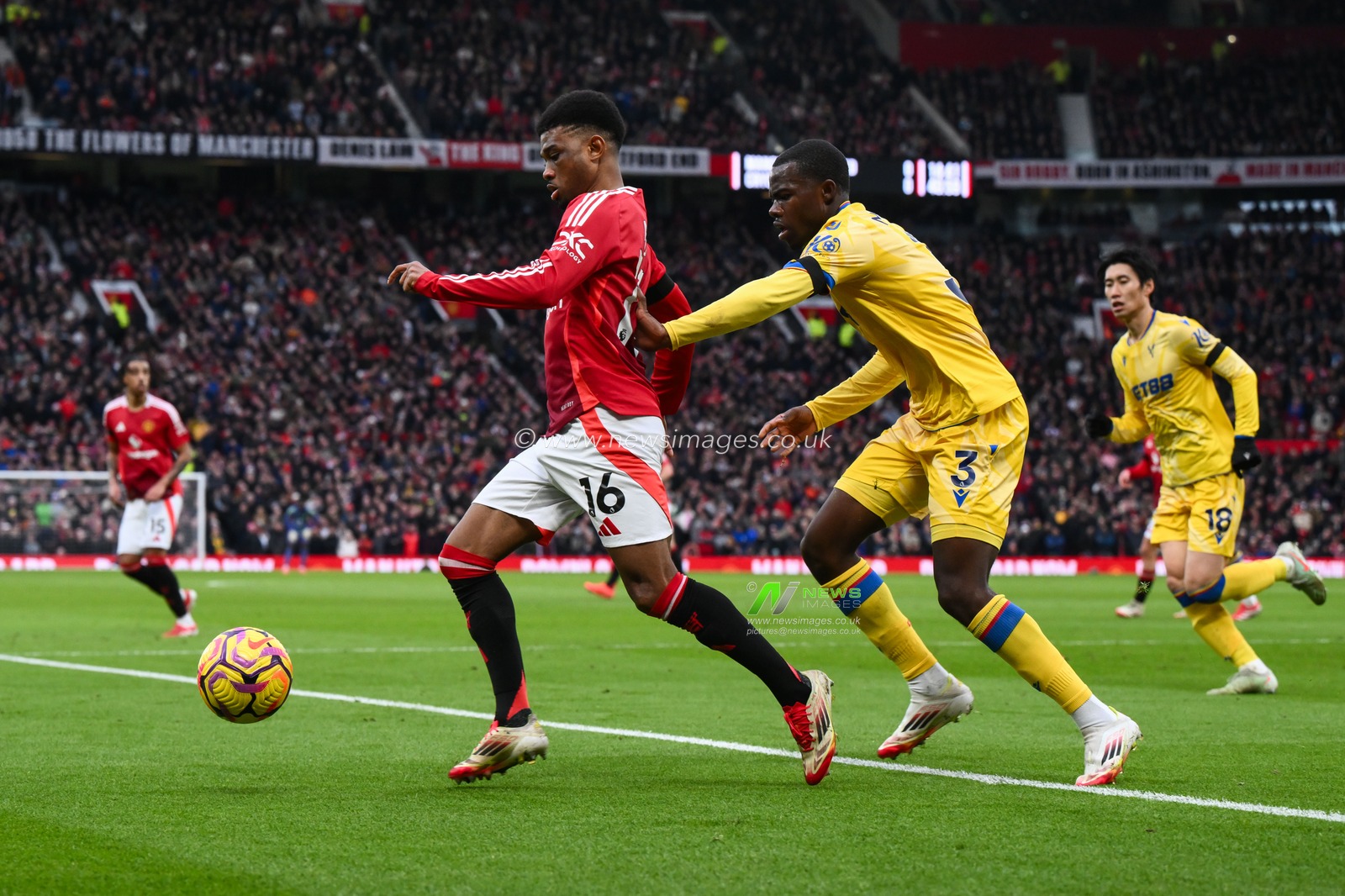 Amad Diallo of Manchester United under pressure from Tyrick Mitchell of Crystal Palace during the Premier League match Manchester United vs Crystal Palace at Old Trafford, Manchester, United Kingdom, 2nd February 2025

(Photo by Craig Thomas/News Images)