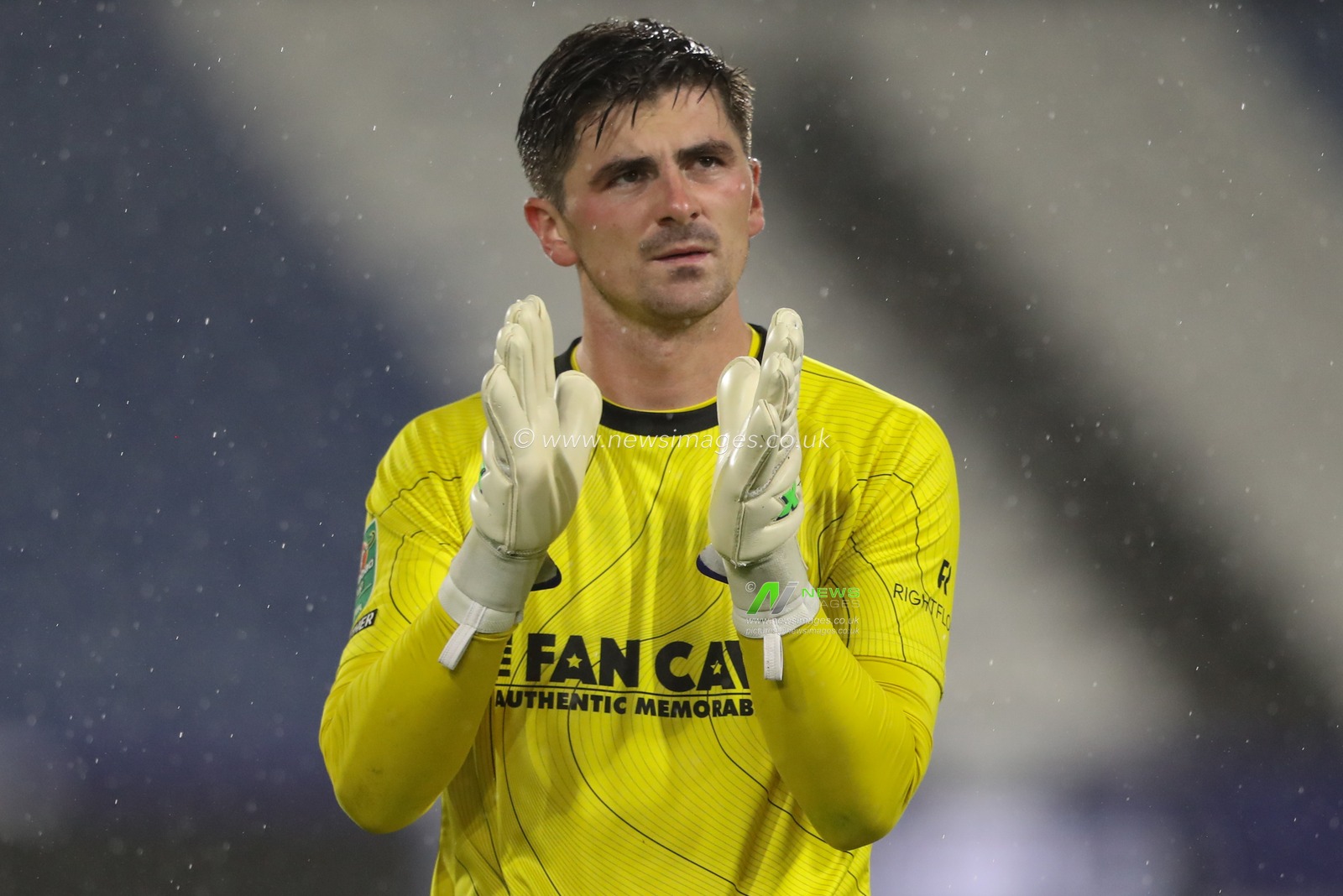 Harry Burgoyne of Morecambe applauds the travelling fans after the game during the Carabao Cup match Huddersfield Town vs Morecambe at John Smith's Stadium, Huddersfield, United Kingdom, 13th August 2024

(Photo by Alfie Cosgrove/News Images)