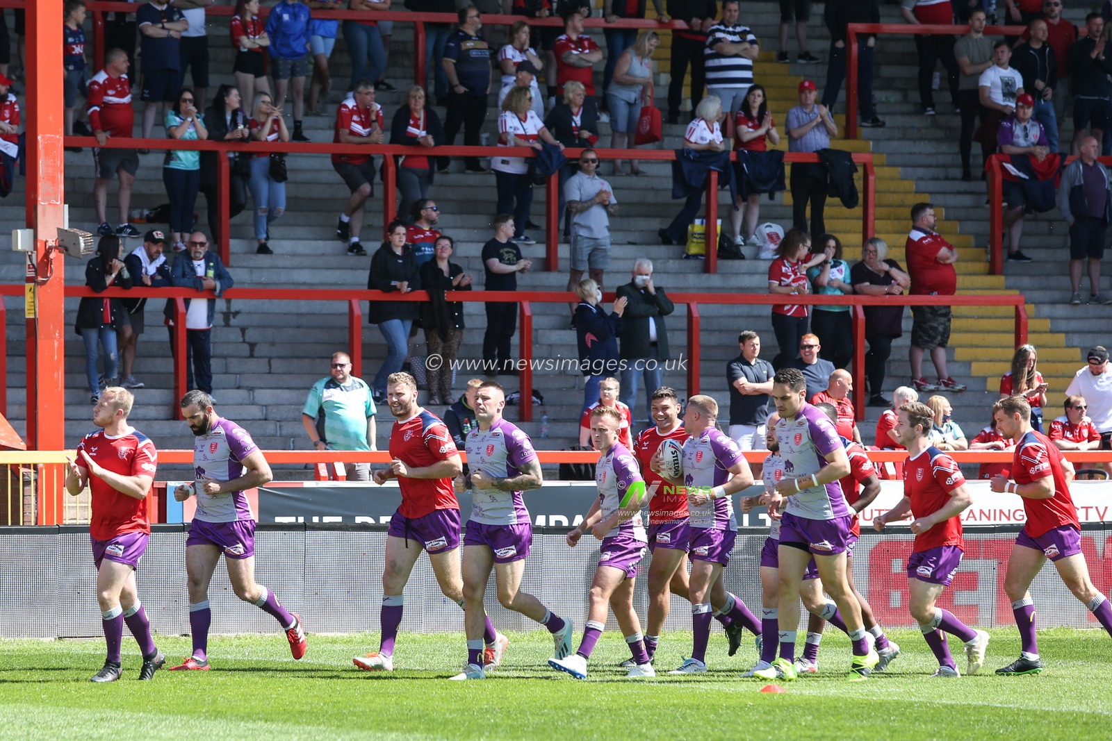 Hull KR players warm up in front of the East Stand fans