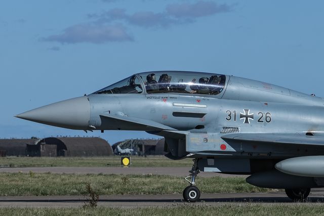 A German Air Force Eurofighter Typhoon FGR Mk4 pilot and engineer wave as it taxies back to the pan during a flight training day at RAF Coningsby, Coningsby, United Kingdom, 22nd September 2025

(Photo by Mark Cosgrove/News Images)