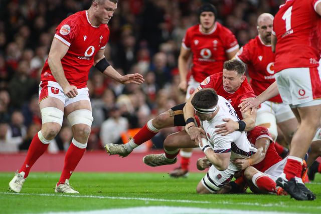 Tom Curry of England is tackled by Elliot Dee of Wales during the 2025 Guinness 6 Nations match Wales vs England at Principality Stadium, Cardiff, United Kingdom, 15th March 2025

(Photo by Andrew Lewis/News Images)