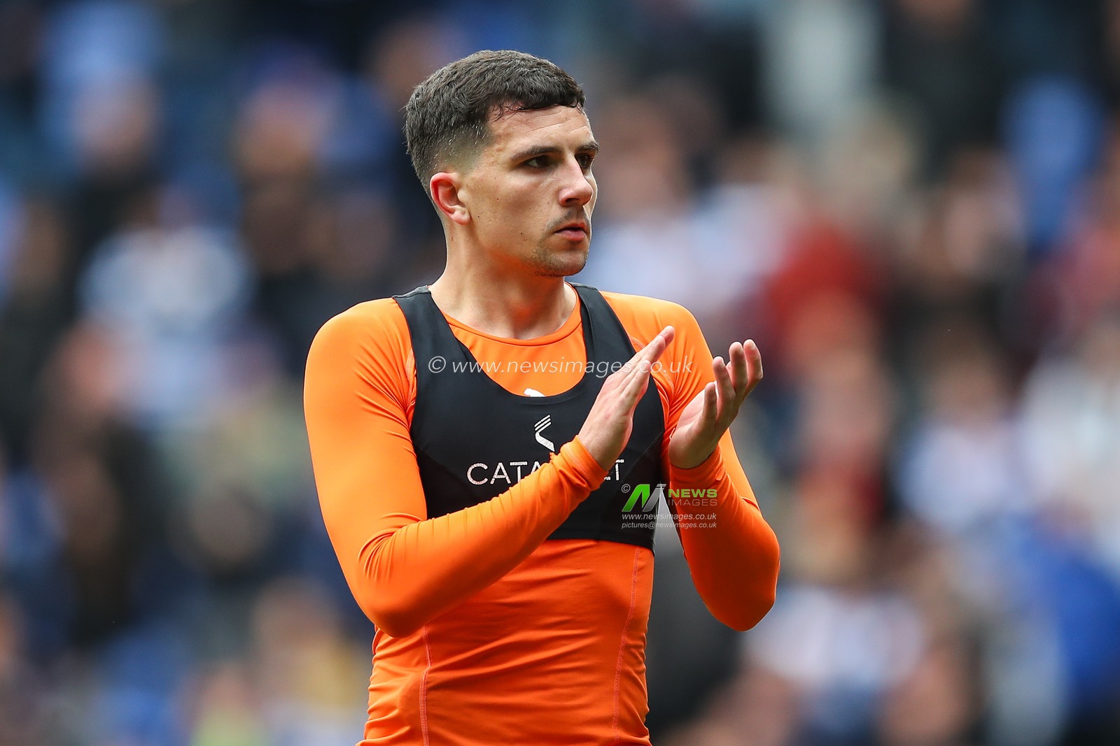 Albie Morgan of Blackpool applauds the travelling fans after the Sky Bet League 1 match Reading vs Blackpool at Select Car Leasing Stadium, Reading, United Kingdom, 27th April 2024

(Photo by Gareth Evans/News Images)