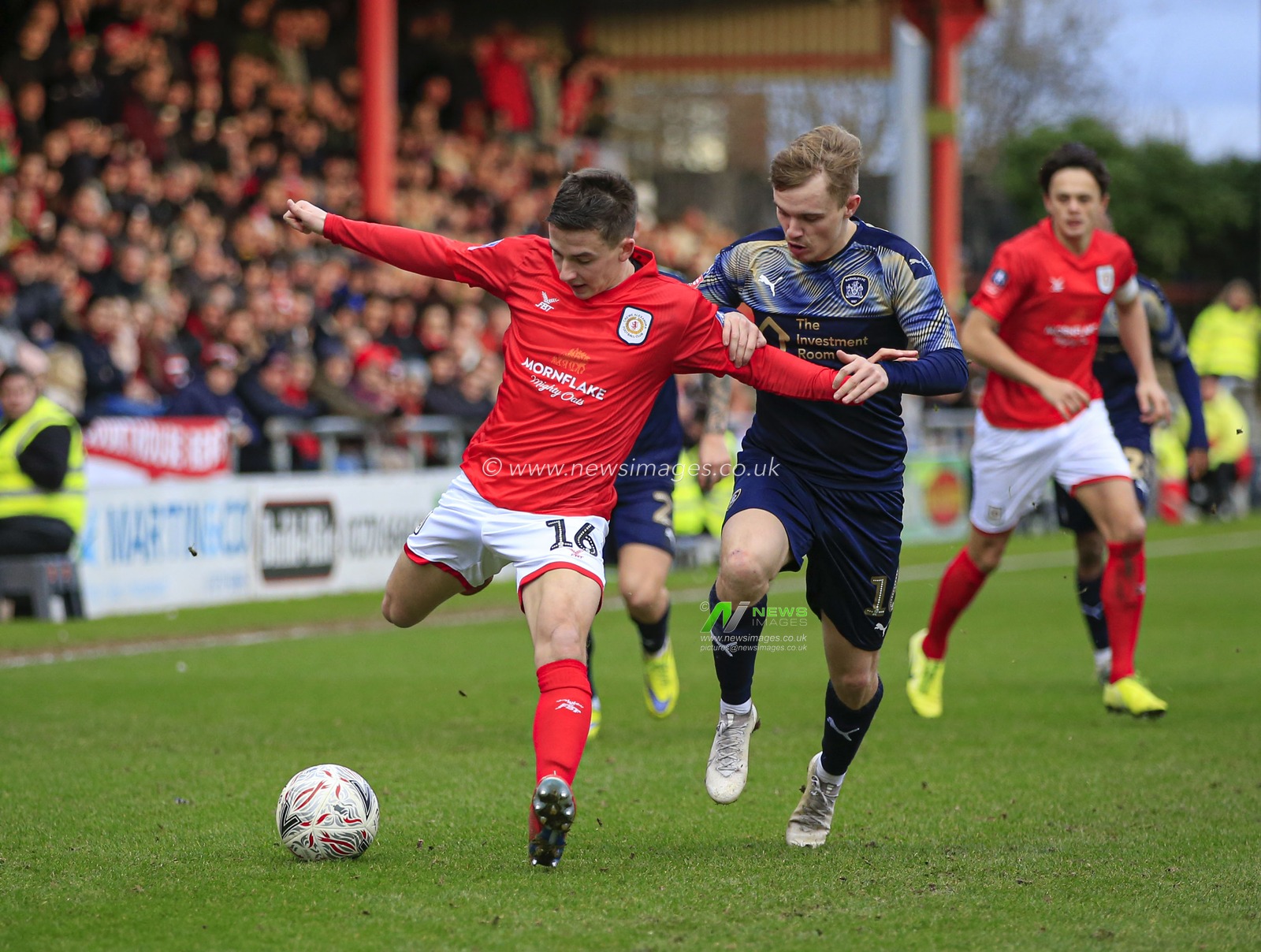 5th January 2020, Alexandra Stadium, Crewe, England; Emirates FA Cup, Crewe Alexandra v Barnsley : Luke Thomas (16) of Barnsley and Tom Lowery (16) of Crewe Alexandra challenge for the ball

Credit: Conor Molloy/News Images