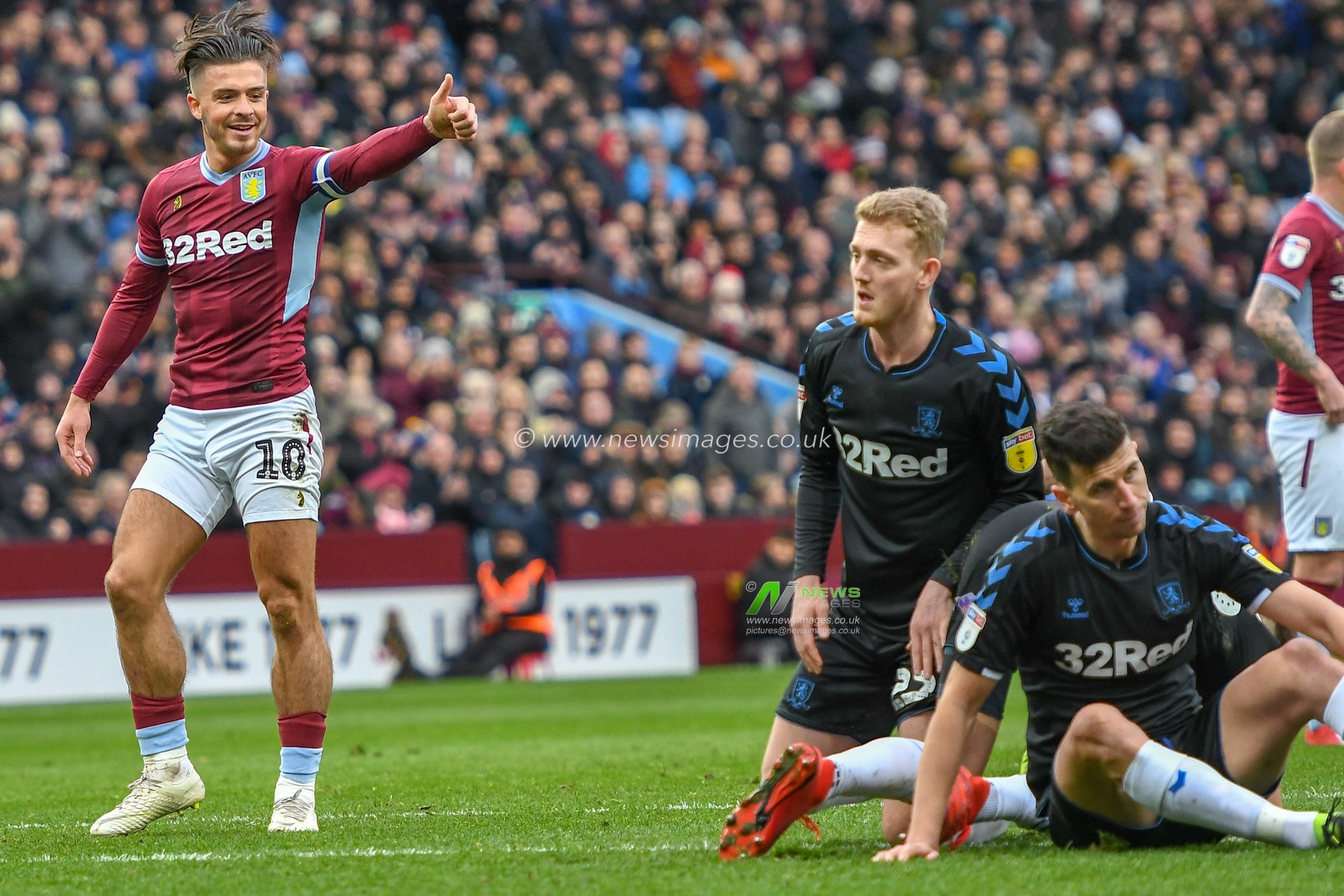 16th March 2019, Villa Park, Birmingham, England ; Sky Bet Championship, Aston Villa v Middlesbrough : Jack Grealish (10) of Aston Villa gives a thumbs up to his team mate

Credit: Gareth Dalley/News Images

English Football League images are subject to DataCo Licence