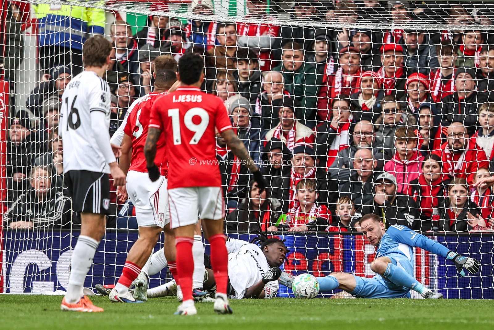 Ibrahim Sangare of Nottingham Forest saves a shot from Calvin Bassey of Fulham during the Premier League match Nottingham Forest vs Fulham at City Ground, Nottingham, United Kingdom on 15 March 2026

(Photo by Alfie Cosgrove/News Images)