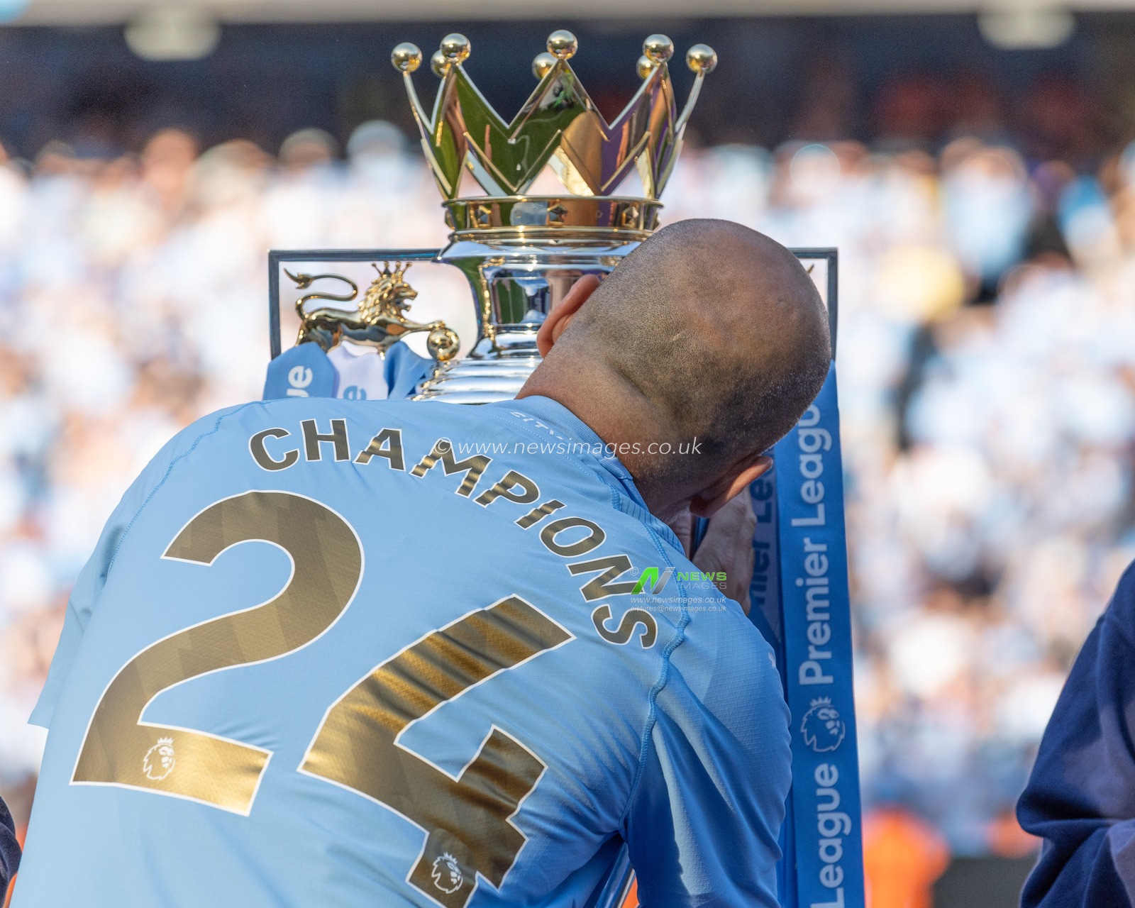 Pep Guardiola manager of Manchester City kisses the Premier League Trophy during the Premier League match Manchester City vs West Ham United at Etihad Stadium, Manchester, United Kingdom, 19th May 2024

(Photo by Mark Cosgrove/News Images)