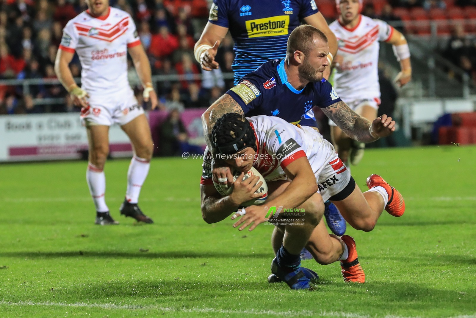 27th September 2019, Totally Wicked Stadium, St Helens, England; Betfred Super League Semi Final, Saint Helens v Wigan Warriors : Jonny Lomax (1) of St Helens goes over for a try 

Credit: Mark Cosgrove/News Images