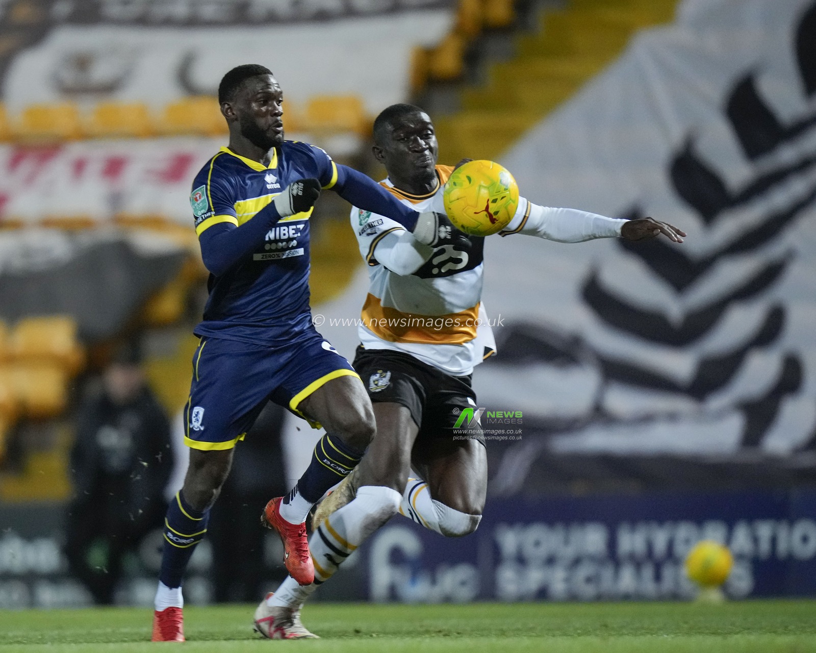 Emmanuel Latte Lath #9 of Middlesbrough breaks past Jesse Debrah #27 of Port Vale during the Carabao Cup Quarter Final match Port Vale vs Middlesbrough at Vale Park, Burslem, United Kingdom, 19th December 2023

(Photo by Steve Flynn/News Images)