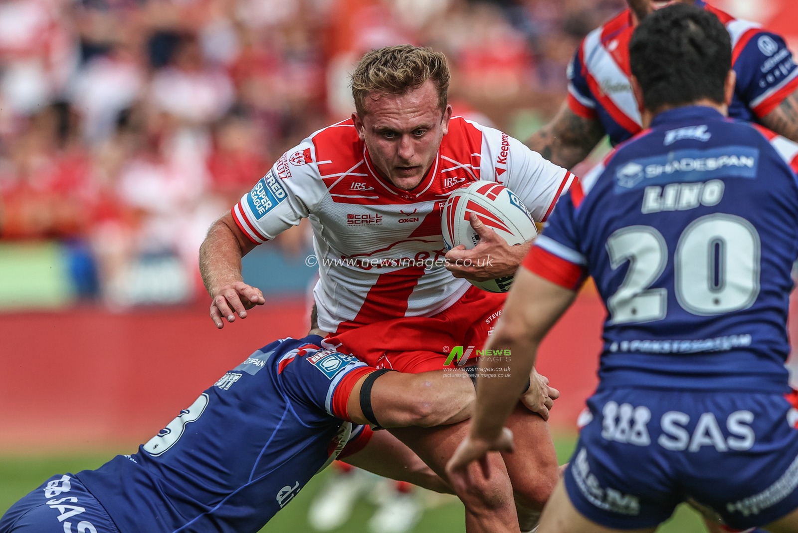 Jez Litten of Hull KR is tackled during the Betfred Super League round 16 match Hull KR vs Wakefield Trinity at Sewell Group Craven Park, Kingston upon Hull, United Kingdom, 27th June 2025

(Photo by Alfie Cosgrove/News Images)