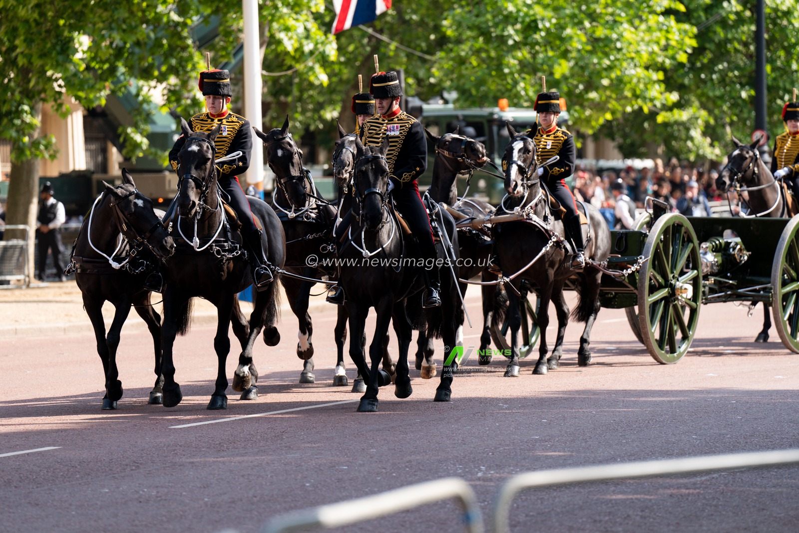 Solders take part in the parade down the mall before and after Trooping the Colour at Horse Guards Parade