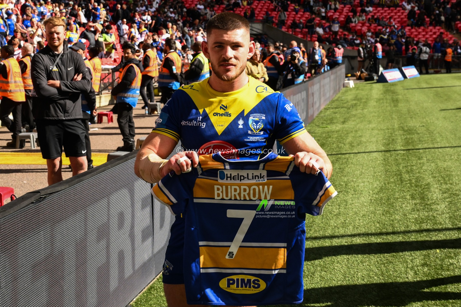 Danny Walker of Warrington Wolves holds up a shirt in memory of Rob Burrow CBE after the Betfred Challenge Cup Final match Warrington Wolves vs Wigan Warriors at Wembley Stadium, London, United Kingdom, 8th June 2024

(Photo by Craig Thomas/News Images)