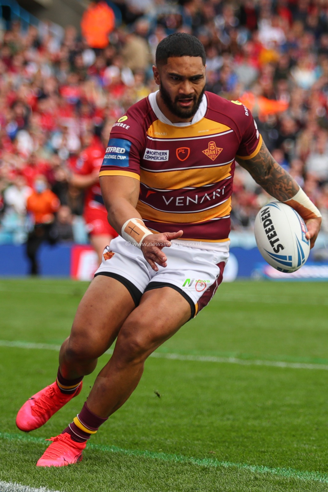 Ricky Leutele #4 of Huddersfield Giants in action during the game
