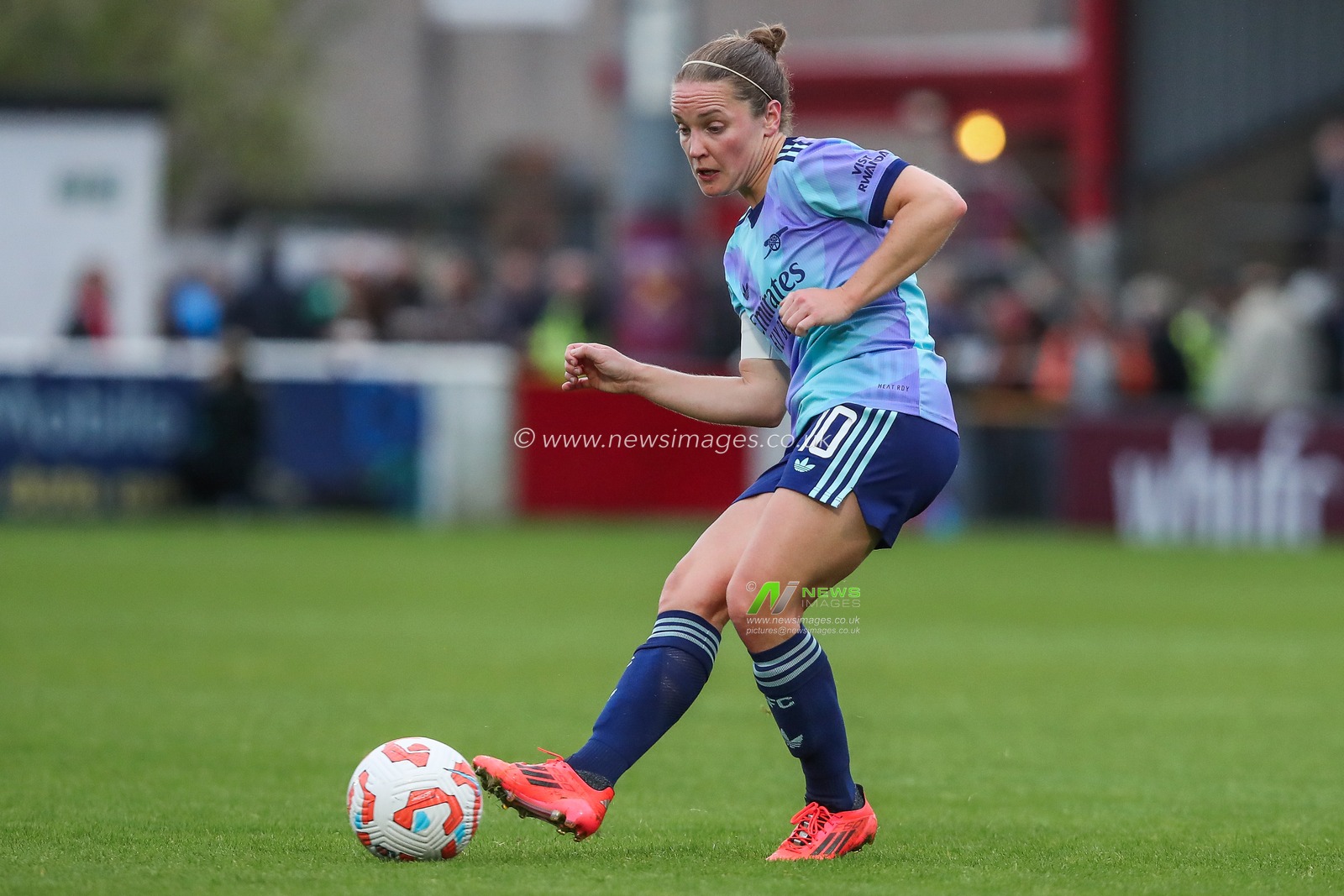 Kim Little of Arsenal passes the ball during the Barclays Women's Super League match West Ham United Women vs Arsenal Women at Chigwell Construction Stadium, Dagenham, United Kingdom, 20th October 2024

(Photo by Izzy Poles/News Images)