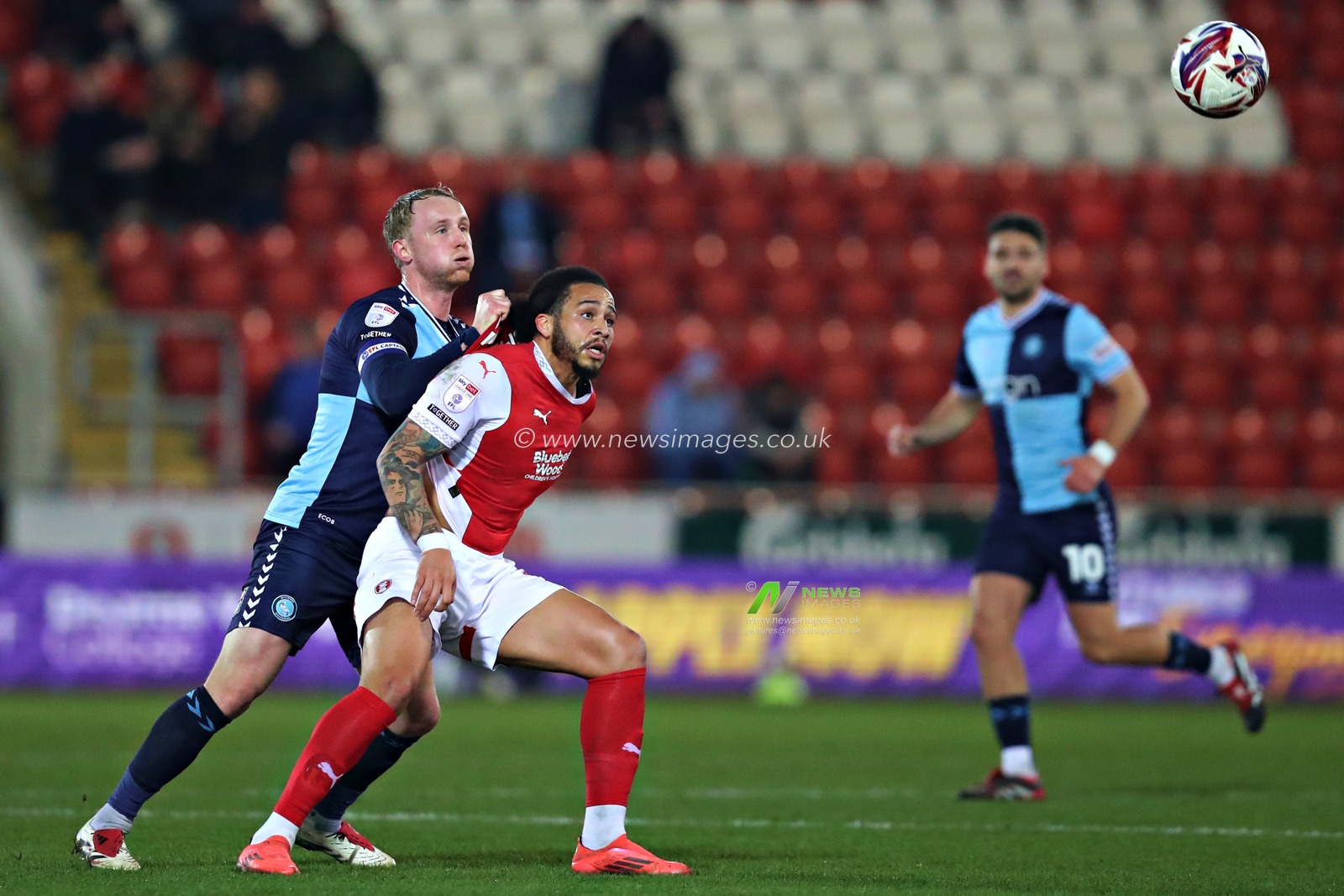 Jack Grimmer of Wycombe Wanderers pressures Sam Nombe of Rotherham United during the Sky Bet League 1 match Rotherham United vs Wycombe Wanderers at New York Stadium, Rotherham, United Kingdom, 18th March 2025

(Photo by Sam Eaden/News Images)