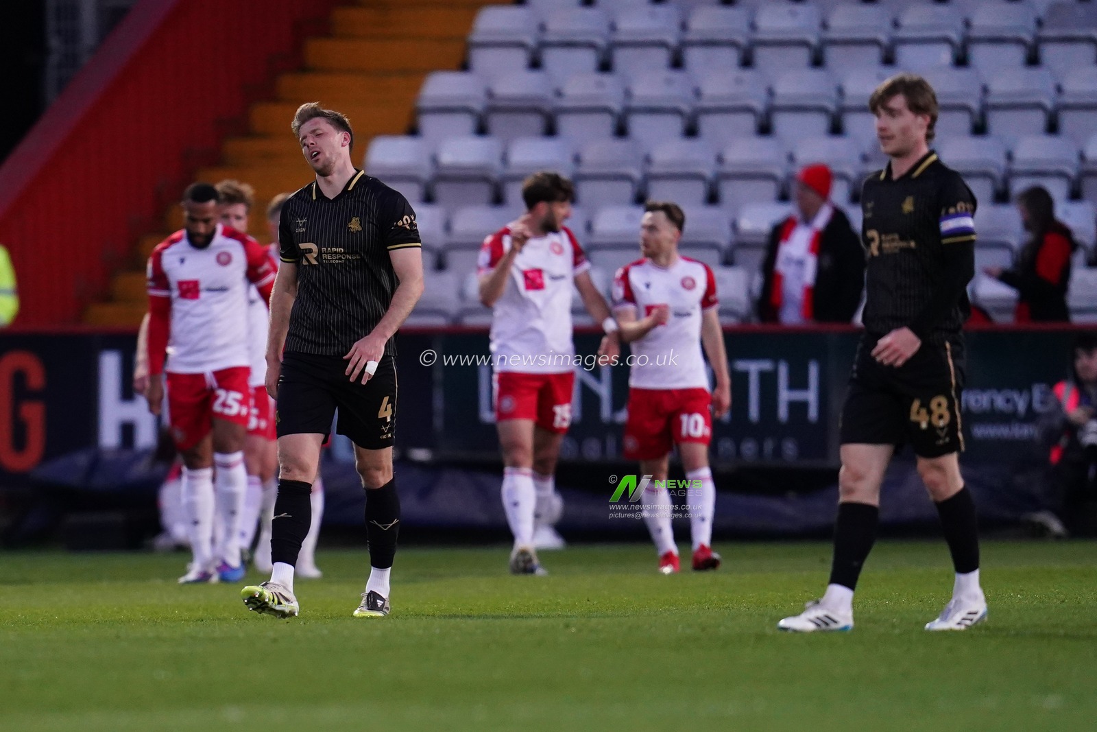 Barnsley players after Stevenage make it 1-0 during the Sky Bet League One match Stevenage vs Barnsley at Lamex Stadium, Stevenage, United Kingdom on 21st April 2026

(Photo by Harvey Murphy/News Images)