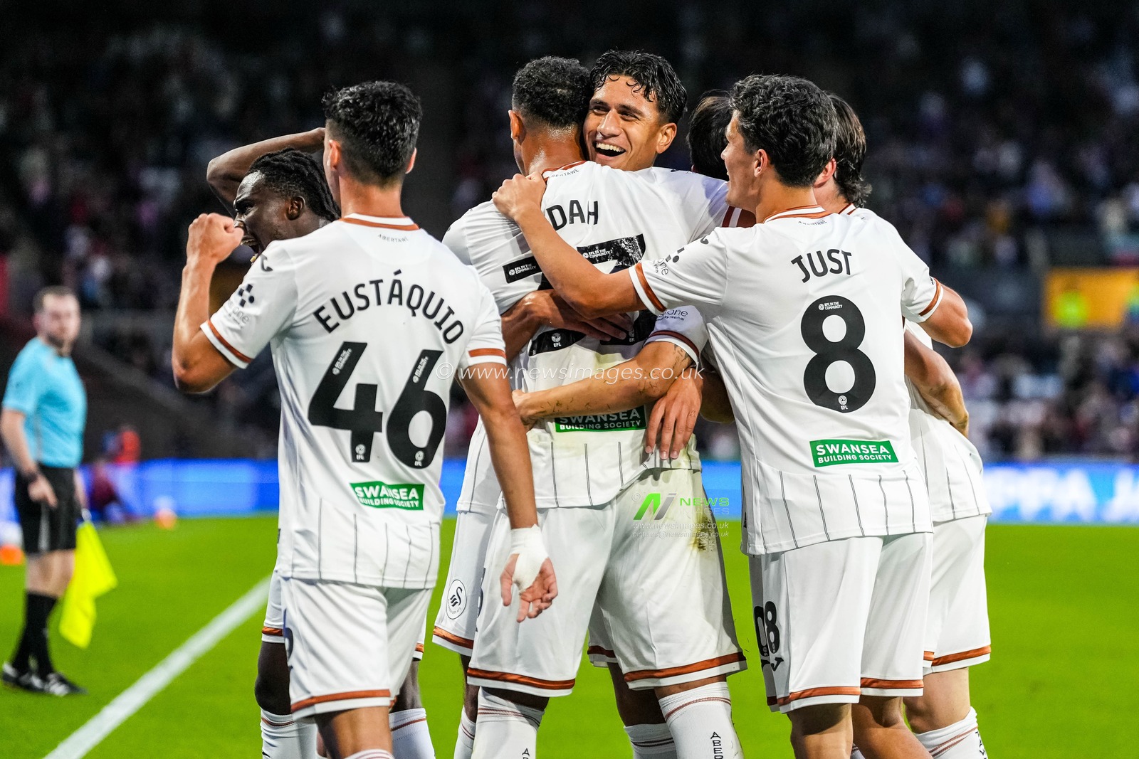 Eom Ji-Sung of Swansea City celebrates scoring his teams first goal with his teammates during the Sky Bet Championship match Swansea City vs Watford at Swansea.com Stadium, Swansea, United Kingdom on 01 September 2026

(Photo by Andrew Lewis/News Images)