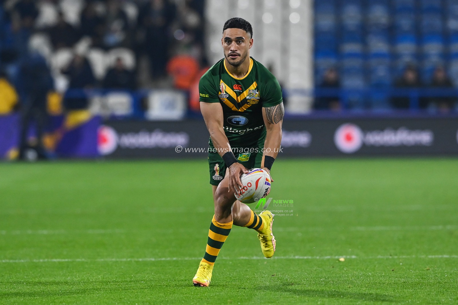 Valentine Holmes of Australia makes a break during the Rugby League World Cup 2021 Quarter Final match Australia vs Lebanon at John Smith's Stadium, Huddersfield, United Kingdom, 4th November 2022

(Photo by Craig Thomas/News Images)
