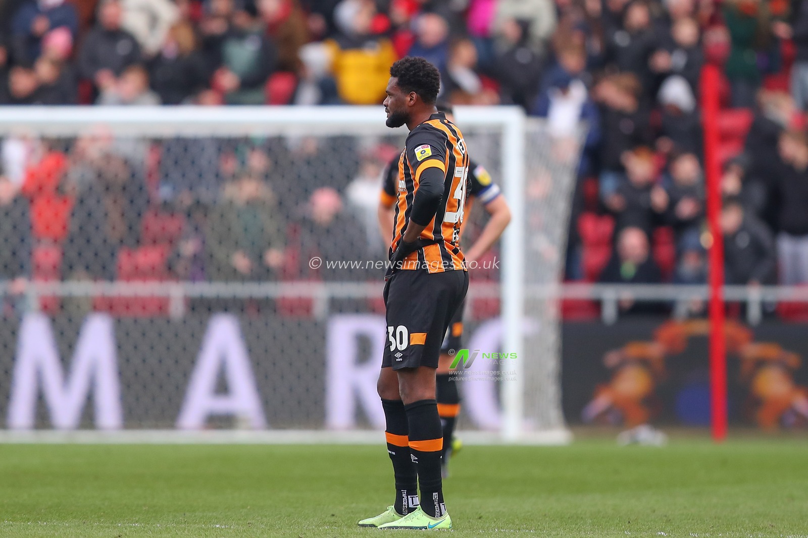 Benjamin Tetteh #30 of Hull City looks dejected after Nahki Wells #21 of Bristol City scores a goal to make it 1-0 during the Sky Bet Championship match Bristol City vs Hull City at Ashton Gate, Bristol, United Kingdom, 25th February 2023

(Photo by Gareth Evans/News Images)