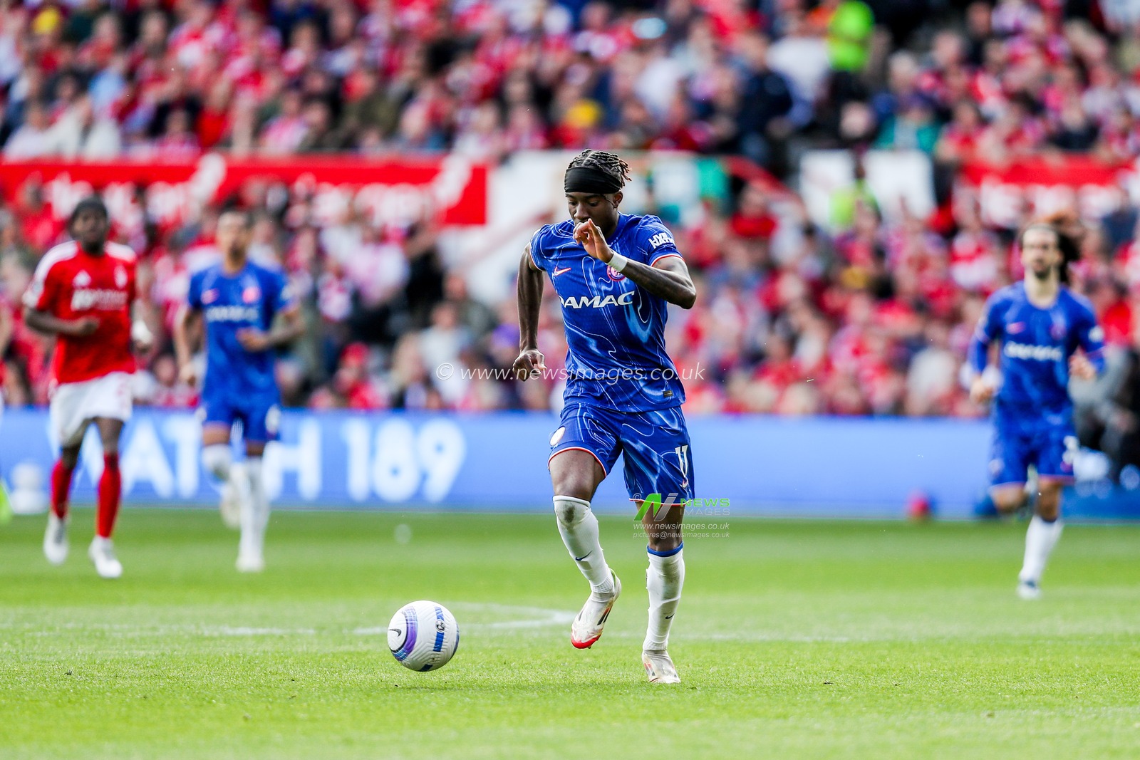 Noni Madueke of Chelsea runs with the ball during the Premier League match Nottingham Forest vs Chelsea at City Ground, Nottingham, United Kingdom, 25th May 2025

(Photo by Izzy Poles/News Images)