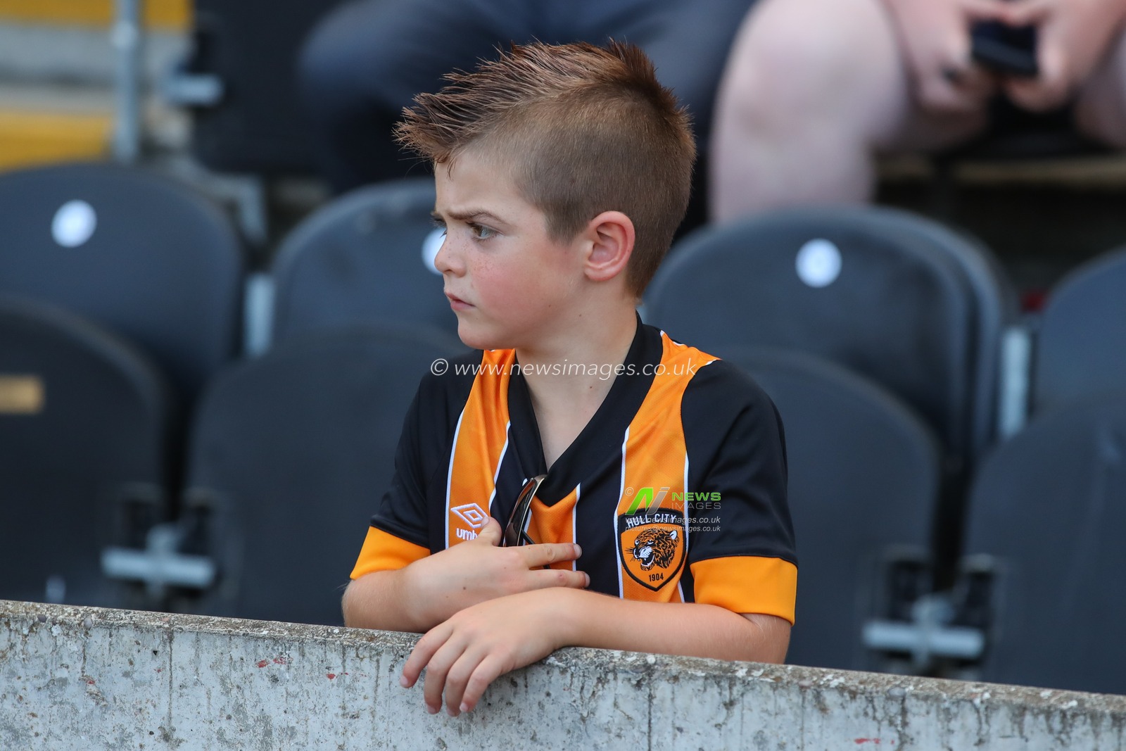 A young Hull City fan inside the MKM Stadium