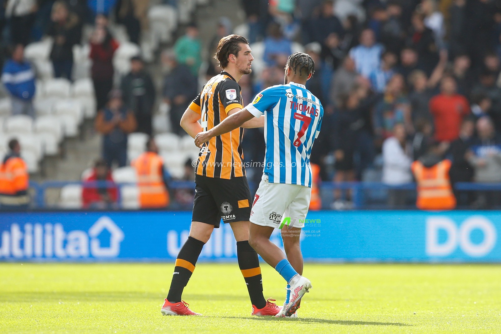 Sorba Thomas #7 of Huddersfield Town and Jacob Greaves #4 of Hull City shake hands after the Sky Bet Championship match Huddersfield Town vs Hull City at John Smith's Stadium, Huddersfield, United Kingdom, 9th October 2022

(Photo by Ben Early/News Images)